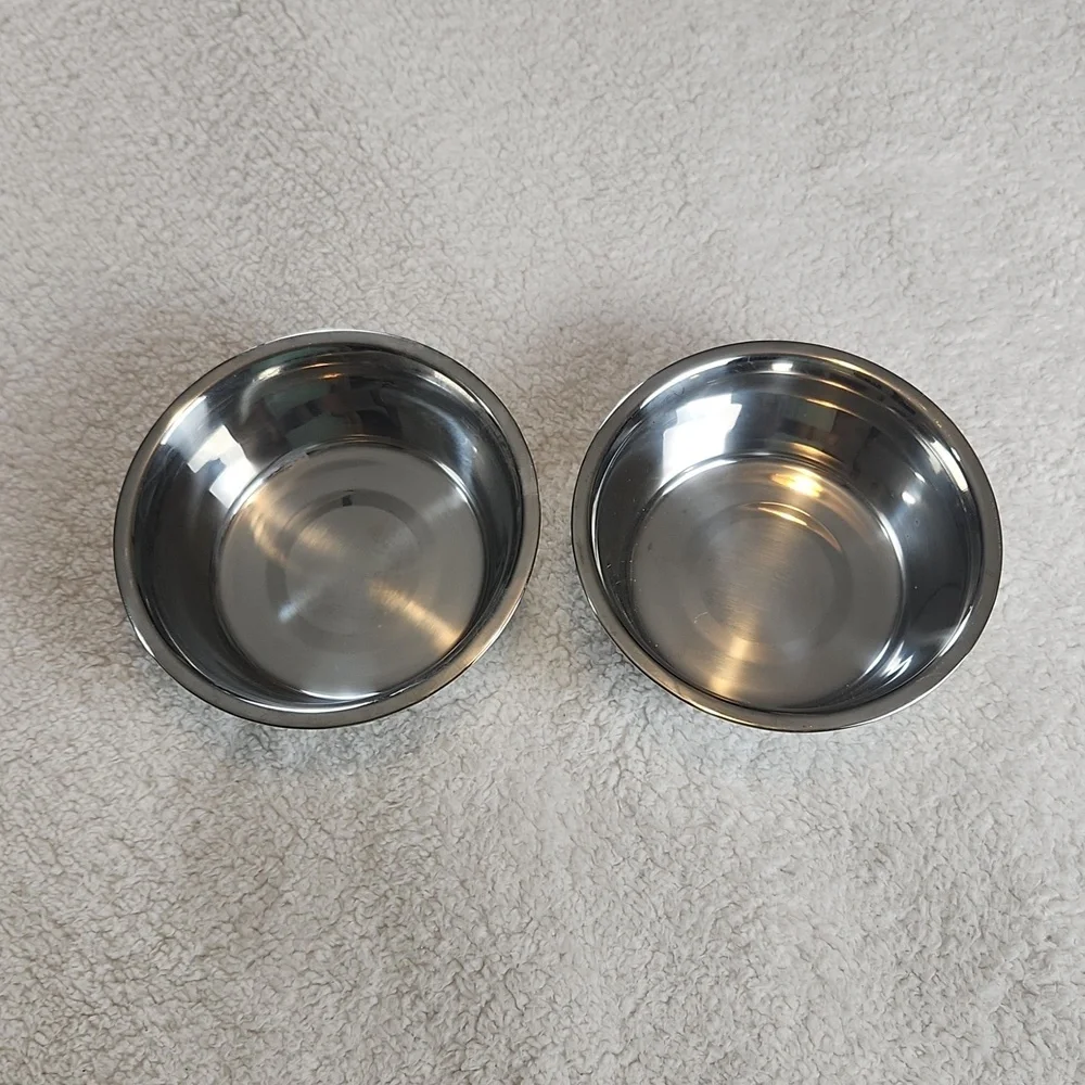 Dog food bowls set of 2, silver colored. Stainless?